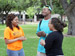 three students talking