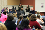 Audience sitting and listening