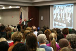 Audience listening to Watson giving speech