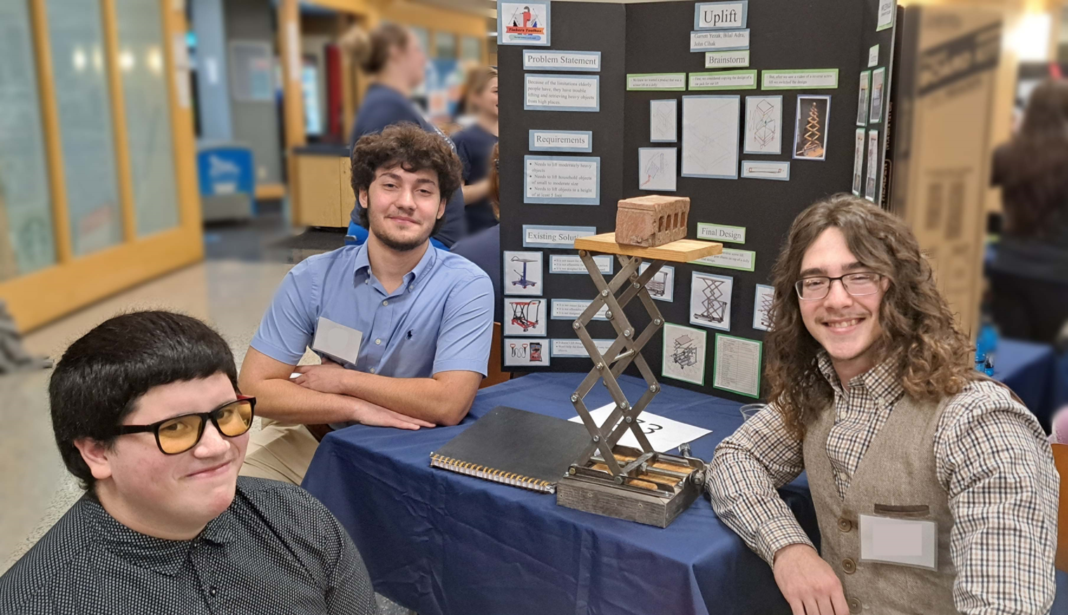 Students showing off Scholar Day project