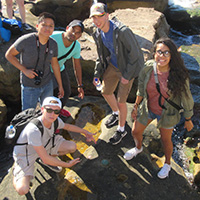 Group of five people standing together