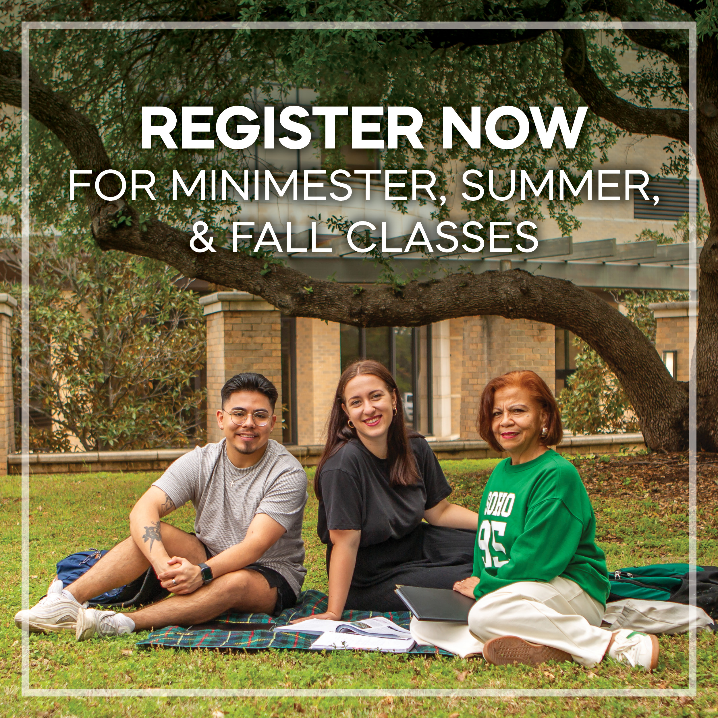 Three MCC students sitting together on the campus lawn, smiling, with the text "Register Now for Minimester, Summer, & Fall Classes.