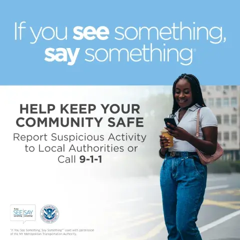 Public safety graphic featuring a person standing outdoors holding a phone, alongside the text ‘If you see something, say something. Help keep your community safe. Report suspicious activity to local authorities or call 9‑1‑1,’ with logos for the See Say campaign and the Department of Homeland Security.