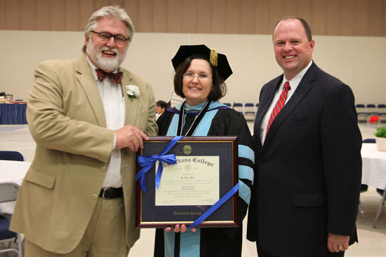 K.P. Holt, Johnette McKown, and another college president