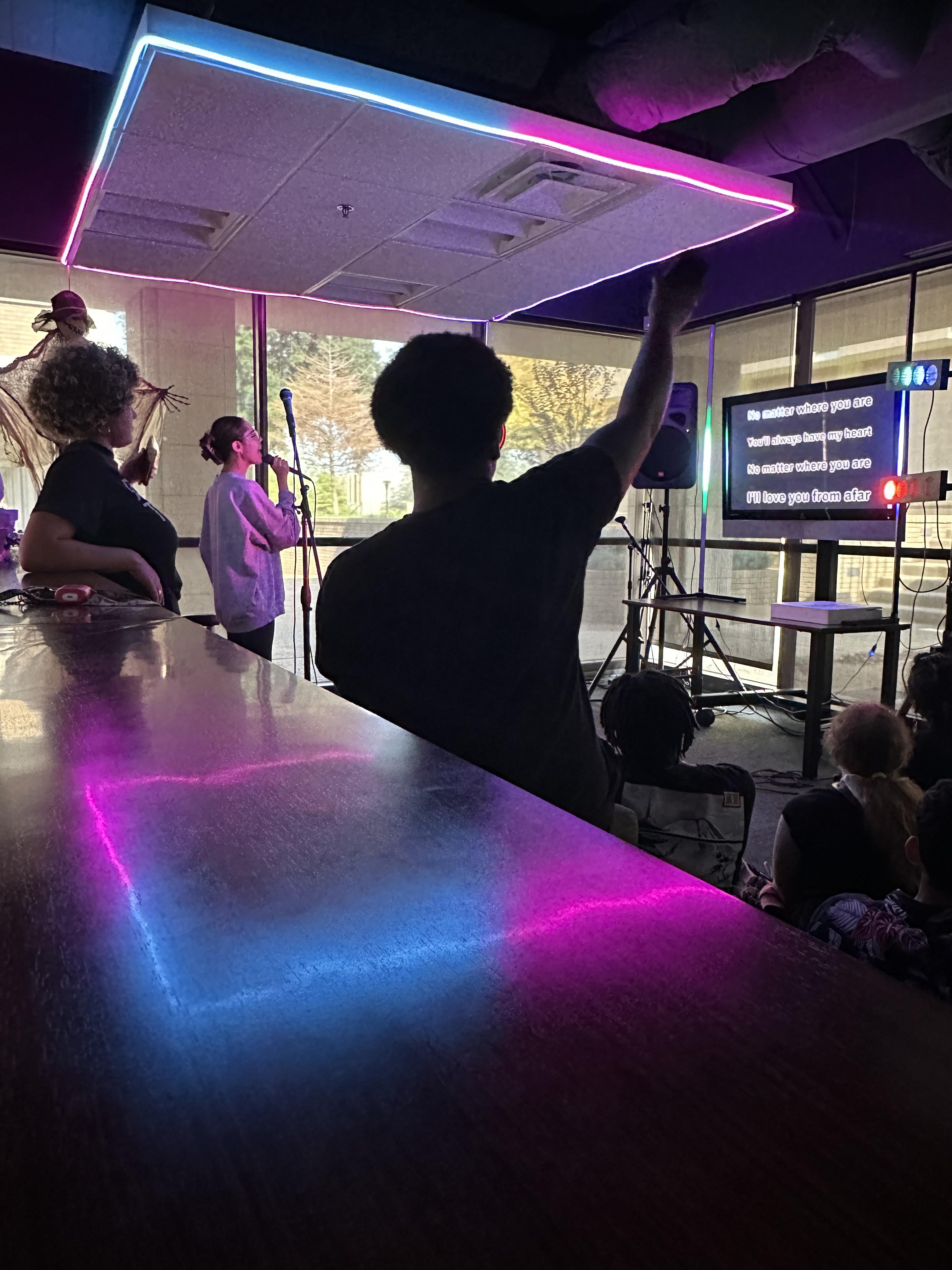 Students singing karaoke
